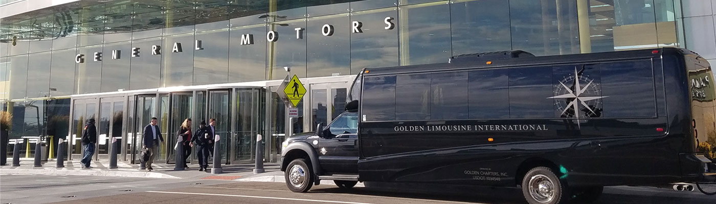 Image of Black Golden Limo Executive Coach parked in front of General Motors Headquarters.