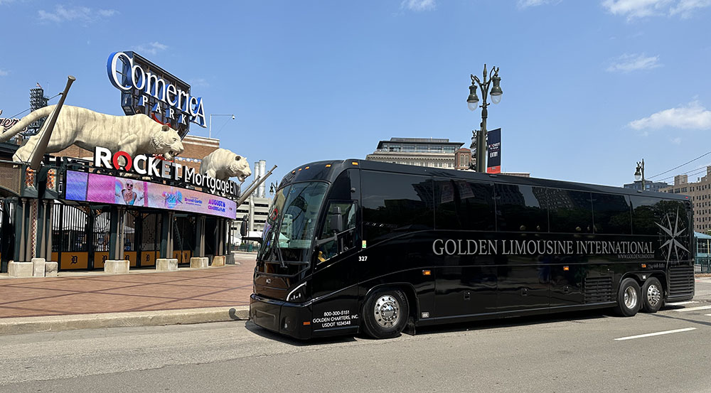 Golden Limousine Coach Bus sitting in front of Detroit Comerica Park