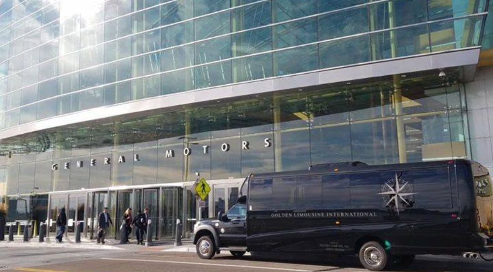 Golden Limousine Shuttle in front of General Motors facility