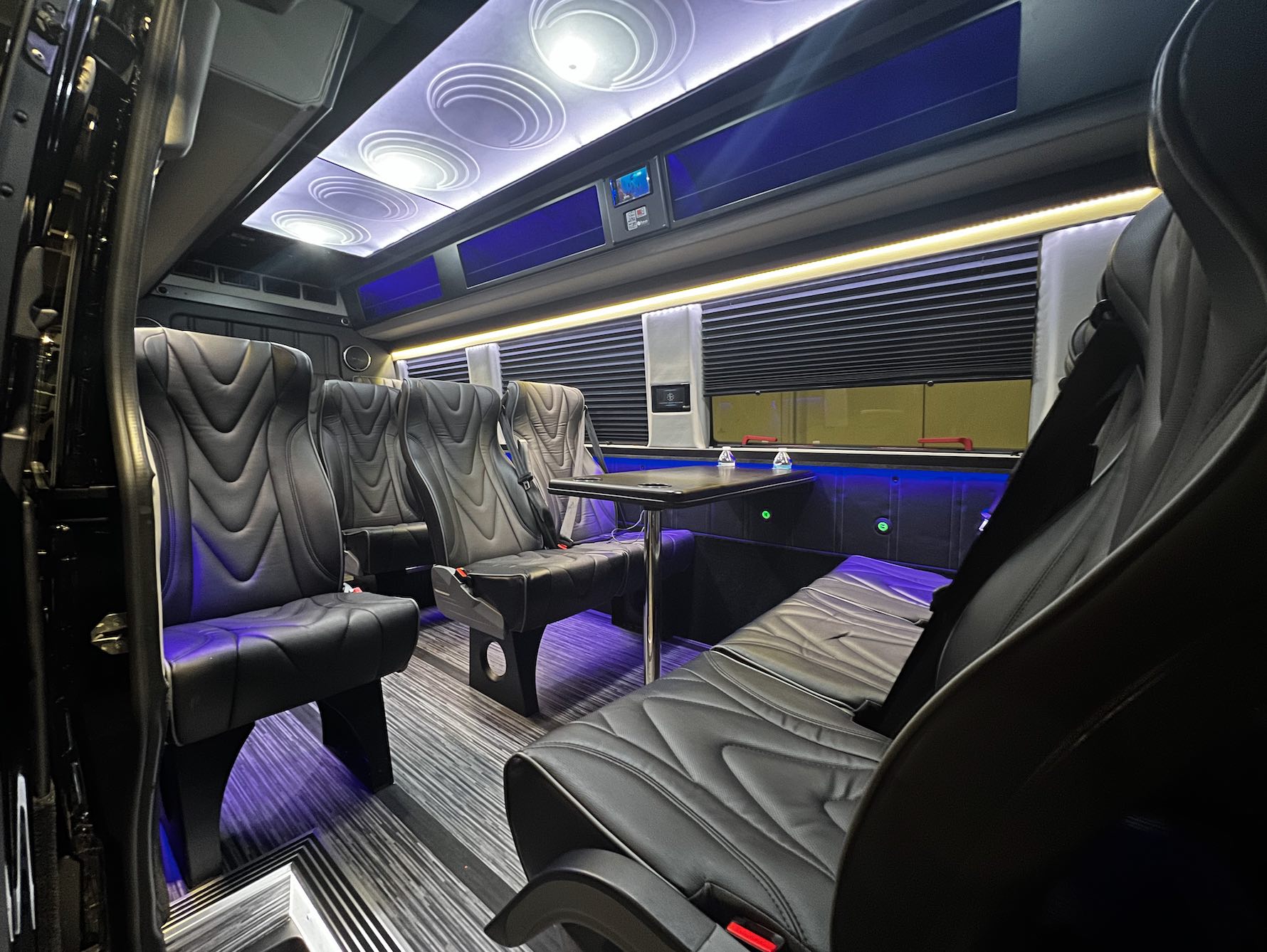 Golden Limo Executive Sprinter Shuttle, interior view with view of conference table seating