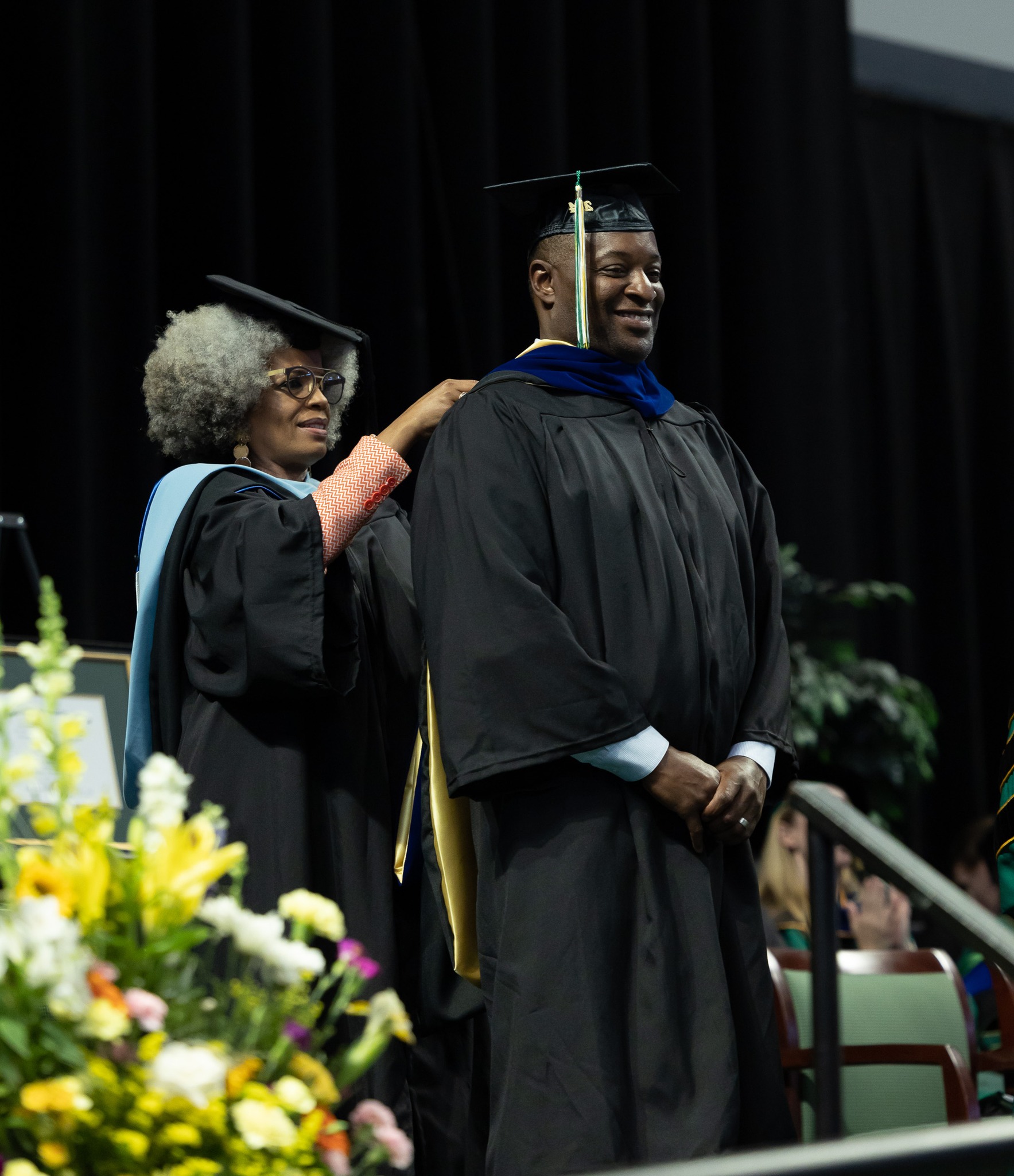 Golden Limo President & CEO Sean Duval receives an honorary Community Service Degree from Washtenaw Community College during the Spring 2024 graduation ceremony.