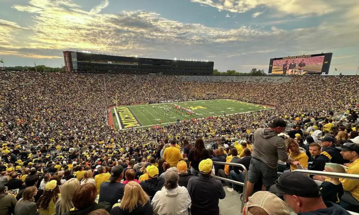 Wide shot view of the University of Michigan Stadium 'Big House' full of fans.