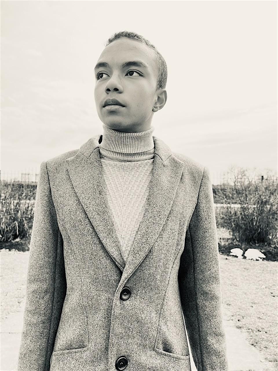 2025_04_GLI_Community_RomanieoGolphinJr._SponsoredTransportation.O Golden Limousine International was proud to provide transportation for Romanieo Golphin Jr. and his recital guests for his special evening - Music, Legacy, & Light at the Detroit Public Library.