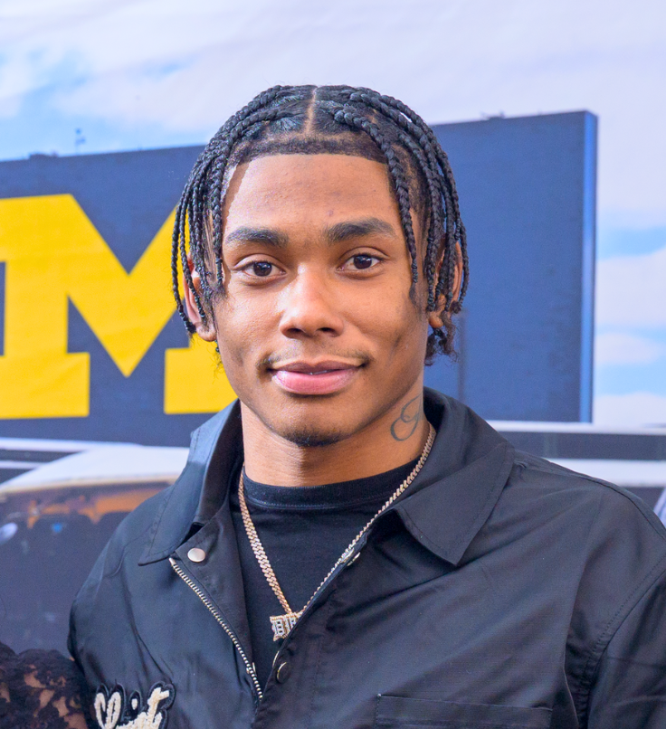 2025_02_GLI_Regional Sports_Zeke Berry_GoldenPartner (1) Golden Limousine International NIL Partner Semaj Morgan, #0 University of Michigan Football Wide Receiver.