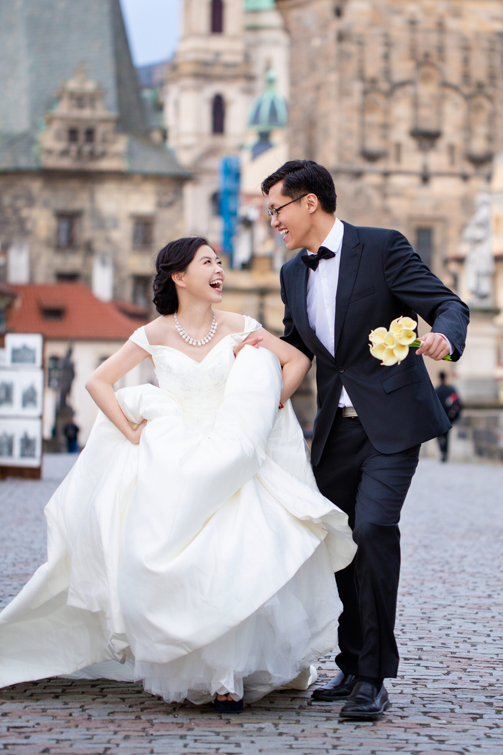 Wedding couple bride and groom in Prague. Couple in love, wedding marriage ceremony and event. Celebration wedding. Young bride and groom couples. Beauty Wedding couple.