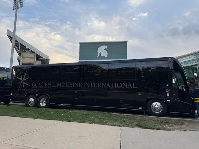 Golden Limousine International vehicle at Sparty Stadium in East Lansing, Michigan.