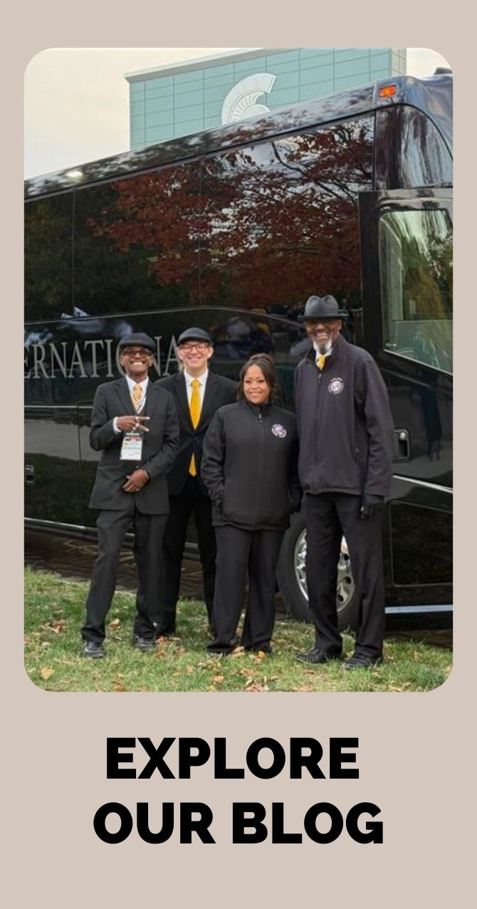 Professional charter bus team standing in front of a luxury motorcoach with "Explore Our Blog" call-to-action text.